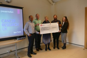 Fire Depot presents cheque to Cancer Research UK