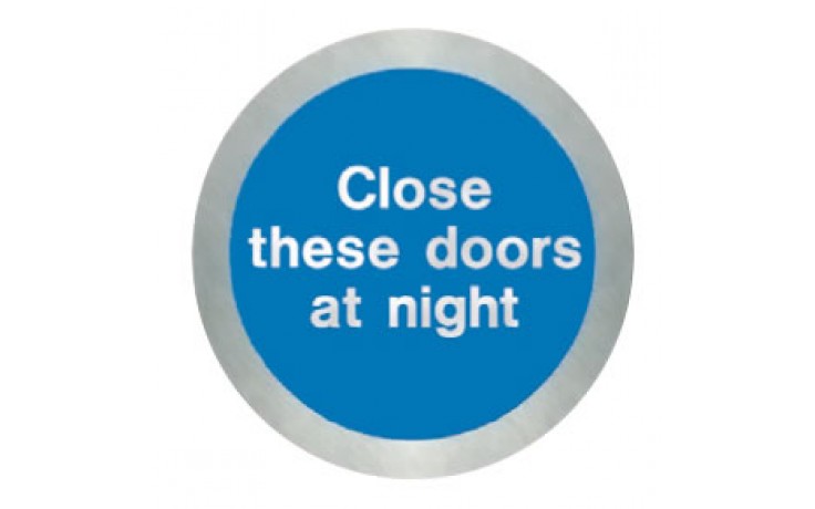 Stainless steel Close these doors at night disc.