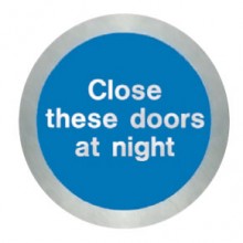 Stainless steel Close these doors at night disc.